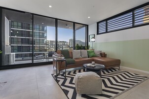 Classic Apartment, 2 Bedrooms | Living area | 55-inch Smart TV with satellite channels