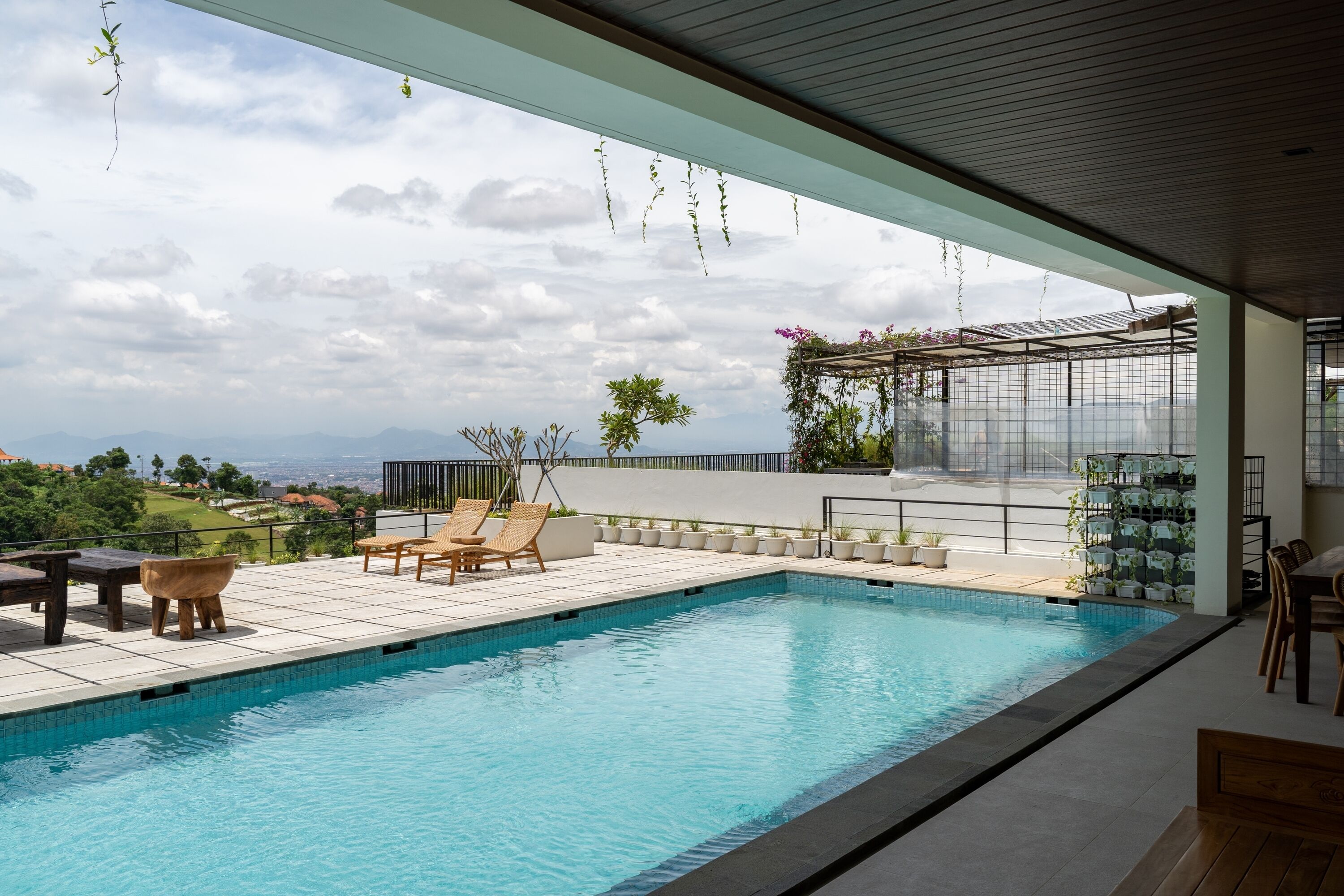 Outdoor pool, a heated pool, pool loungers