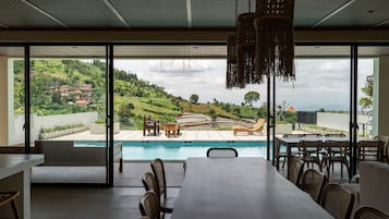 Villa | Living area | 42-inch Smart TV with cable channels