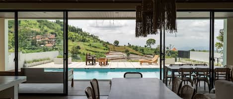 Villa | Living area | 42-inch Smart TV with cable channels