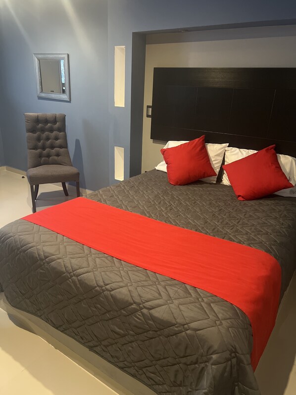 Standard Single Room | Blackout curtains, iron/ironing board, free WiFi, bed sheets