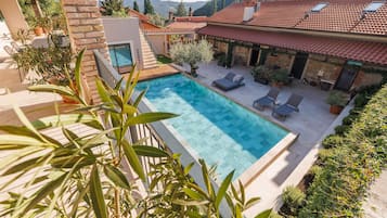 Outdoor pool, open 8:30 AM to 10:00 PM, pool umbrellas, sun loungers
