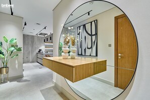 Apartment | Living area | 55-inch LCD TV with satellite channels, Netflix, streaming services - bnbme | Forte | 3 + Maids (Dubai)