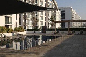 Pool - Misk 1BR Urban Oasis - Downtown Aljada (الشارقة)