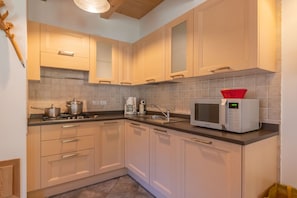 Fridge, microwave, dishwasher, coffee/tea maker