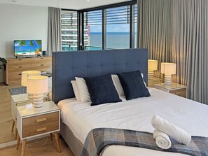 2 habitaciones, tabla de planchar con plancha y cuna de viaje 