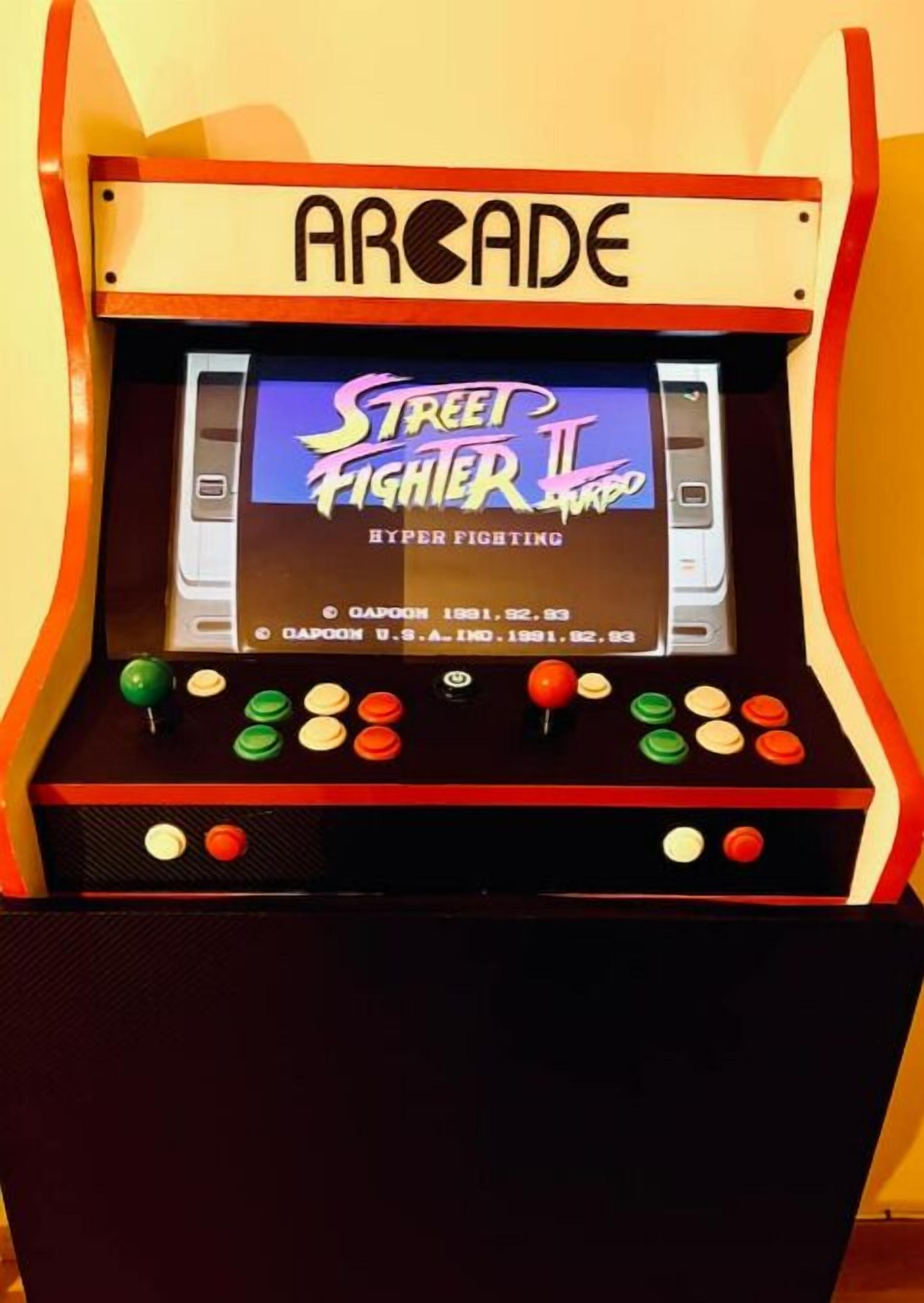 An arcade machine with the title "Street Fighter II" and a selection of buttons.