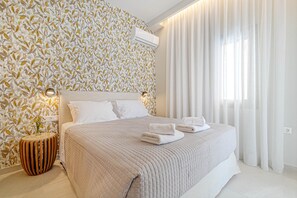 2 bedrooms, in-room safe, iron/ironing board, travel cot