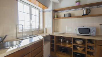 Apartment, Sea View | Bathroom | Shower, hair dryer, towels, soap