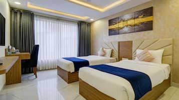 Familie vierpersoonskamer | Een bureau, geluiddichte muren, gratis wifi