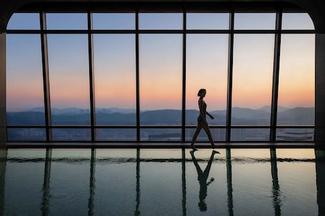 Indoor pool, open 6:00 AM to 10:30 PM, sun loungers