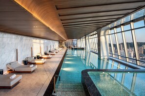 Indoor pool, open 6:00 AM to 10:30 PM, pool loungers