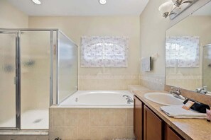 Shower, eco-friendly toiletries, hair dryer, towels