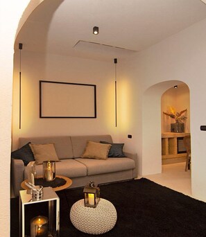 Luxury Suite | Living area | 42-inch LCD TV with cable channels - Borgo Bevagna Relais (Manduria)