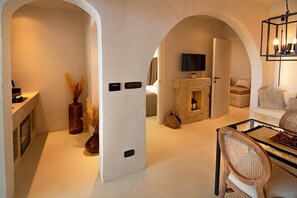 Junior Suite | Living area | 42-inch LCD TV with cable channels - Borgo Bevagna Relais (Manduria)