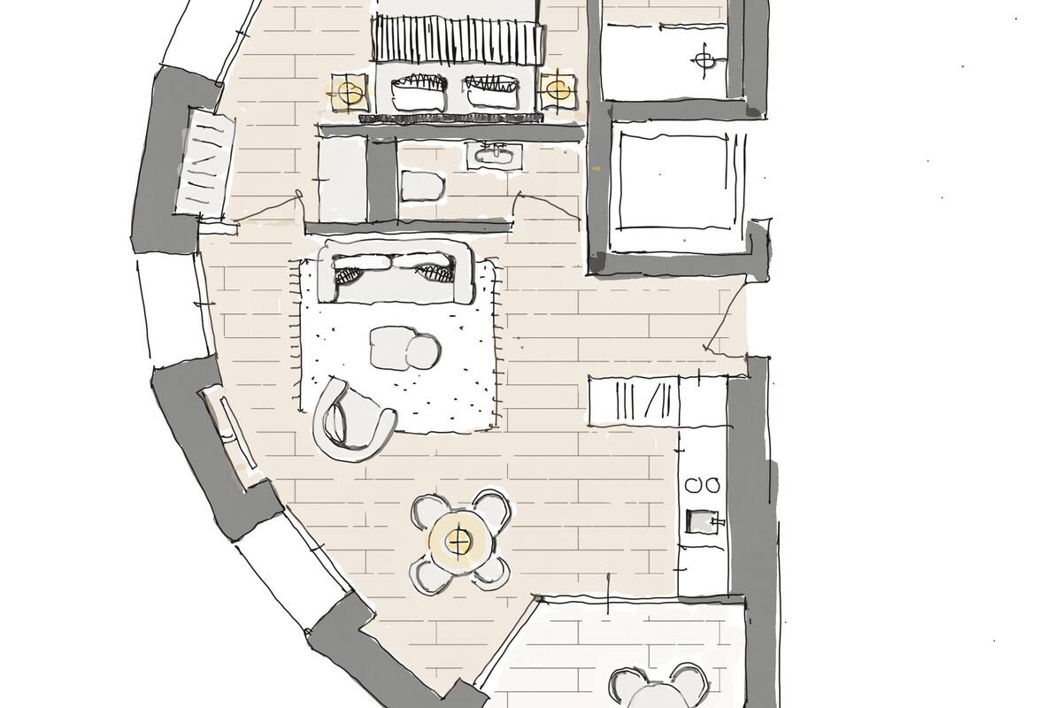 Un plan d’étage d’un appartement de petite taille comprenant une cuisine, un coin repas et un petit salon.