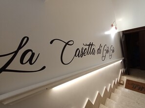 A wall with the text "La Casetta di Giò" indicating a location or establishment.