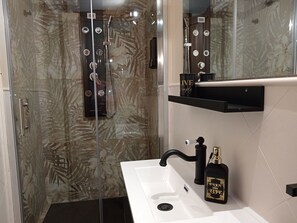 Hair dryer, bidet, towels, soap