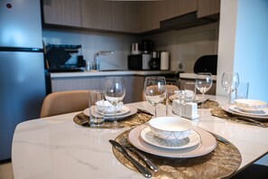 Deluxe Apartment | Dining room - SuperHost - Downtown Gem: 1BR Apartment at Act One l Act Two (Dubai)