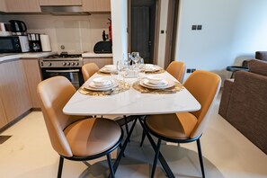 Deluxe Apartment | Dining room - SuperHost - Downtown Gem: 1BR Apartment at Act One l Act Two (Dubai)