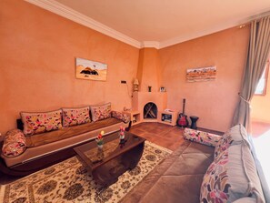 Smart TV, fireplace, books