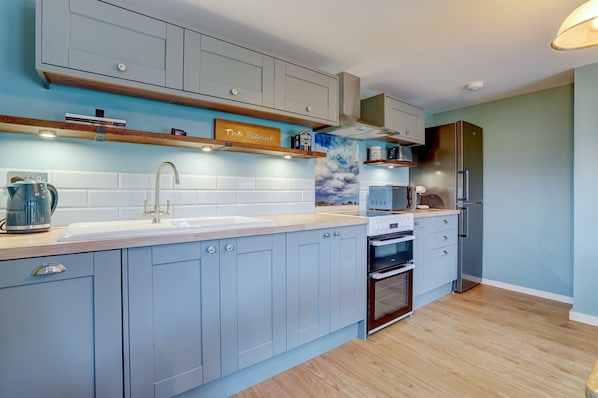 Fridge, microwave, oven, cookware/dishes/utensils