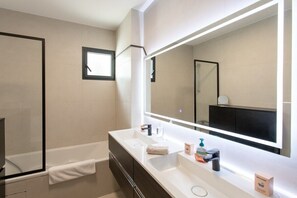 Hair dryer, towels, soap, shampoo