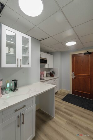 Fridge, microwave, coffee/tea maker, toaster