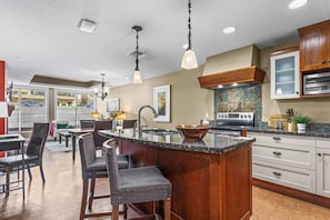 Fridge, microwave, oven, stovetop - Solara Escape – 2BR | Pool • Hot Tub • Gym. Spa (Canmore)