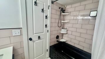 Jetted tub, hair dryer, towels, soap