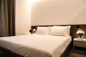 Neljän hengen perhehuone | Ylelliset vuodevaatteet, untuvapeitot, memory foam -patjalliset sängyt