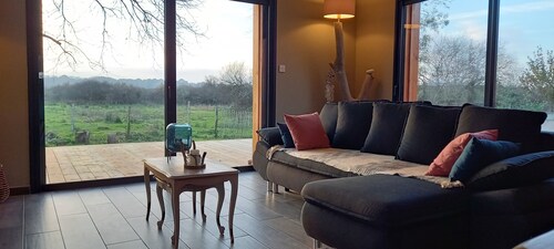 Agréable villa neuve orientée vers la nature et le coucher de soleil!