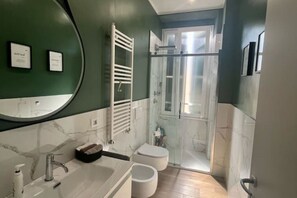 Shower, free toiletries, hair dryer, bathrobes