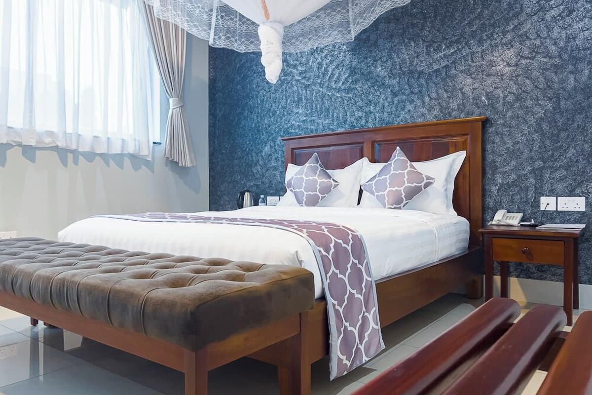 Chambre Double Deluxe | 1 chambre, Wi-Fi gratuit