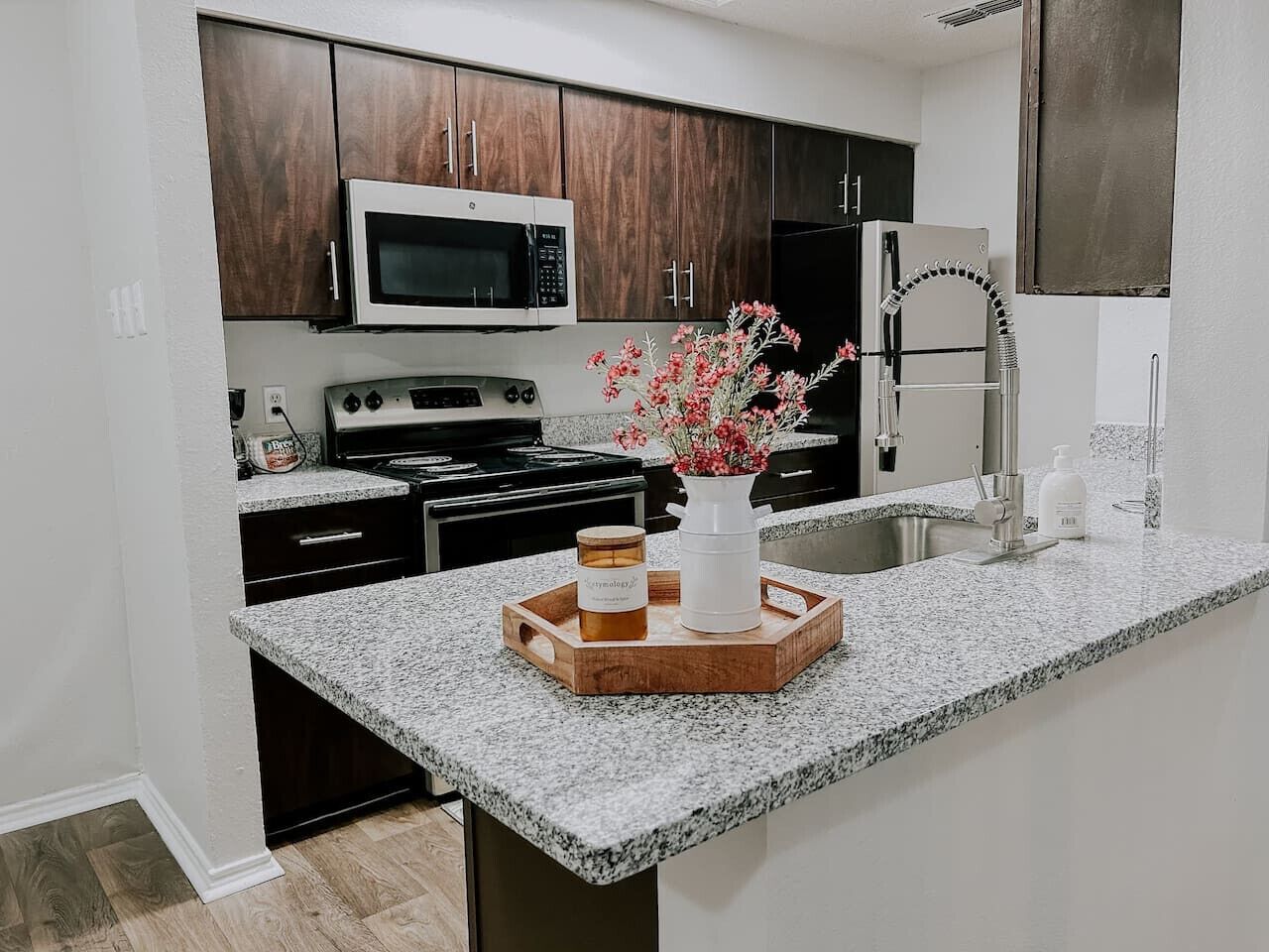 Fridge, coffee/tea maker, cookware/dishes/utensils