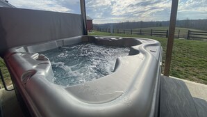 A hot tub with a view of a fenced property and a cloudy sky. - Red River Ranch Retreat- HOT TUB, Views, Pond- Near RRG (Frenchburg)