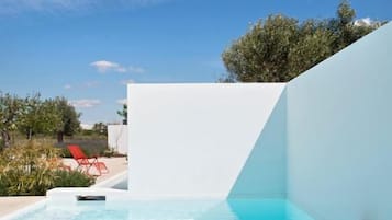 Outdoor pool, pool umbrellas, pool loungers