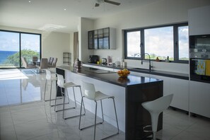 Fridge, microwave, oven, stovetop - Luxurious 6-Bedroom Villa with Private Pier & Panoramic Ocean View (Jeremi)
