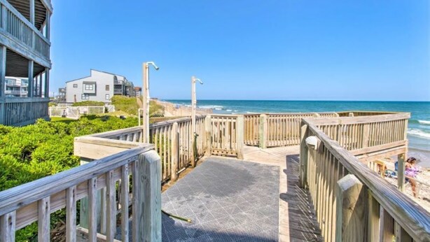 A wooden boardwalk leading to a beach with a clear view of the ocean. - Oceanfront North Topsail Beach Condo w/Pool! Linens and towels provided (North Topsail Beach)