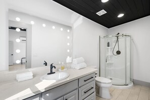 Shower, towels - Cozy Retreat: 2 Homes w BBQ Playhouse & Pool (Spicewood)