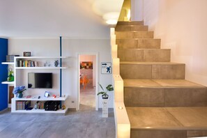 Deluxe Apartment, Terrace, Sea View | Living area | 32-inch flat-screen TV with digital channels - YourHome - Karme House (Meta)