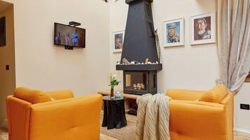 Flat-screen TV, fireplace