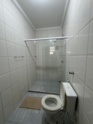 Shower, towels, soap, toilet paper