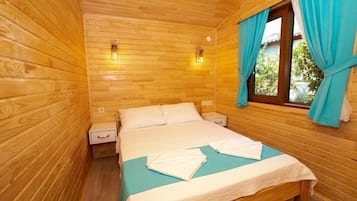 Bungalow Deluxe, 1 habitación, no fumadores, vistas al jardín | 1 dormitorio, escritorio, wifi gratis y ropa de cama