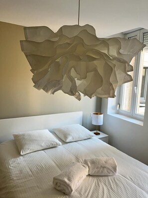 2 slaapkamers, een strijkplank/strijkijzer, wifi, beddengoed