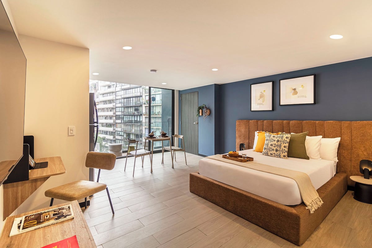 Apartment (Studio with Queen Bed and Balcony) | Premium bedding, desk, laptop workspace, WiFi (free)