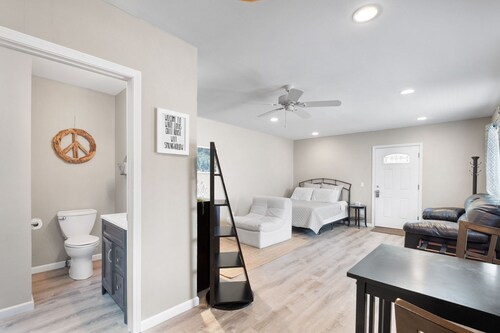 Private deck with hot tub and fire pit.