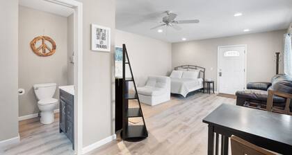Private deck with hot tub and fire pit.