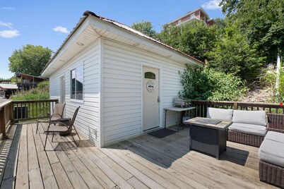 Private deck with hot tub and fire pit.