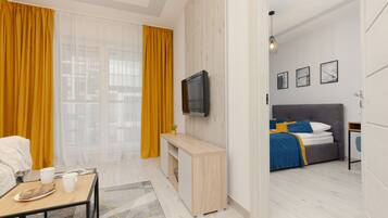 Apartemen, 1 kamar tidur, balkon | Area keluarga